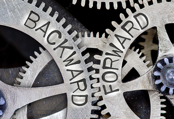 Gears have the words "backward" and "forward" written on them