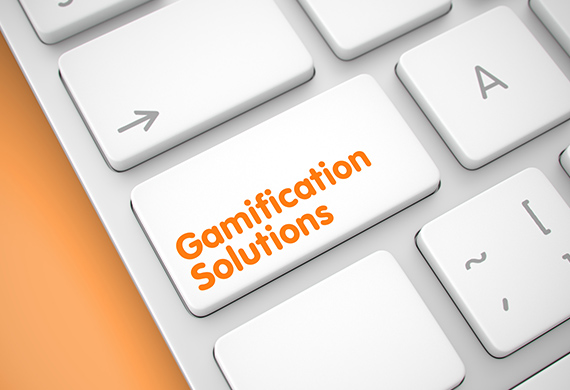 Computer keyboard has button with the words, "gamification solutions" on it