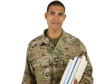 Person in military gear holds notebooks