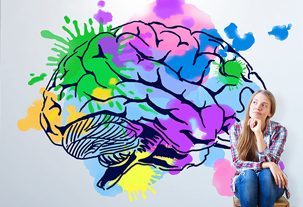 Girl sits on stool showing metacognitive skills