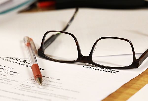 glasses-on-paper-on-desk-grading