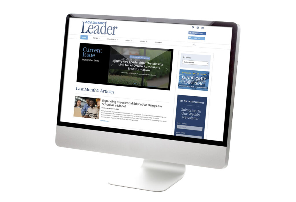 computer with the Academic Leader website on screen