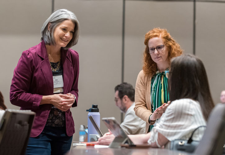 a teaching professor conference presenter answering questions during a preconference workshop